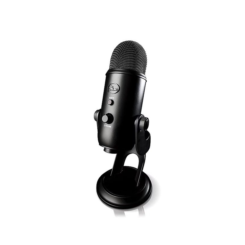 Blue Yeti USB microphone on a desk with the gain knob facing forward
